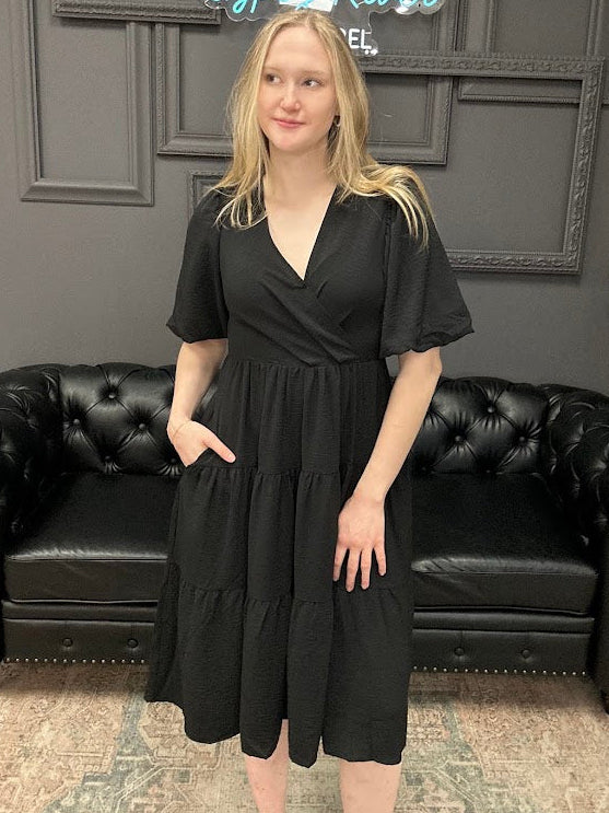 wrap midi dress, balloon sleeve dress, tiered midi dress, black midi dress, boutique dress with pockets, women’s midi dress