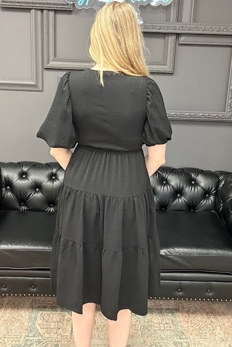 wrap midi dress, balloon sleeve dress, tiered midi dress, black midi dress, boutique dress with pockets, women’s midi dress