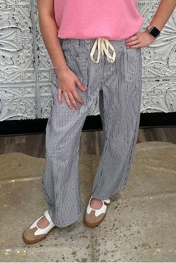 striped barrel pants, drawstring waist pants, black and white stripe pants, boutique wide leg pants, relaxed fit striped trousers, casual chic pants
