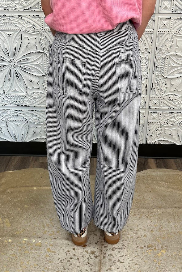 striped barrel pants, drawstring waist pants, black and white stripe pants, boutique wide leg pants, relaxed fit striped trousers, casual chic pants