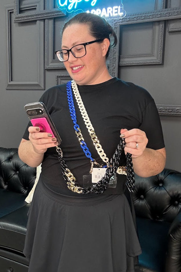 phone chain strap, crossbody phone strap, black blue white phone lanyard, chunky chain phone strap, gold hardware phone strap, hands-free phone holder, stadium accessories