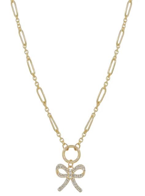 Gold necklace with a bow pendant on a white background