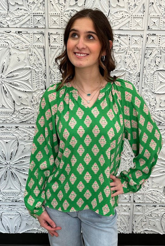green printed blouse, pink print top, boutique women’s blouse, bold statement blouse, relaxed fit long sleeve top, colorful work blouse