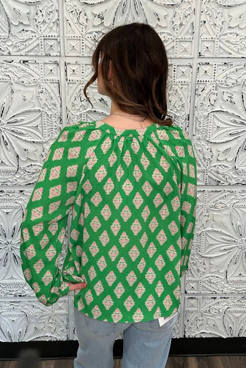 green printed blouse, pink print top, boutique women’s blouse, bold statement blouse, relaxed fit long sleeve top, colorful work blouse