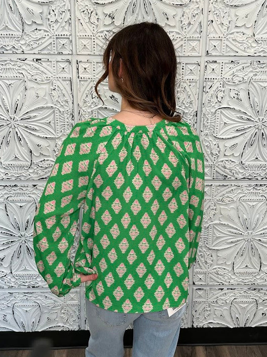 green printed blouse, pink print top, boutique women’s blouse, bold statement blouse, relaxed fit long sleeve top, colorful work blouse