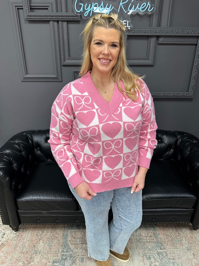 Flattering V-neckline
Ribbed cuffs, neckline, and hem
Relaxed fit that’s easy to wear
bow and heart sweater, V neck sweater, Valentine sweater, heart pattern sweater, women’s novelty sweater, boutique sweaters, Gypsy River Apparel