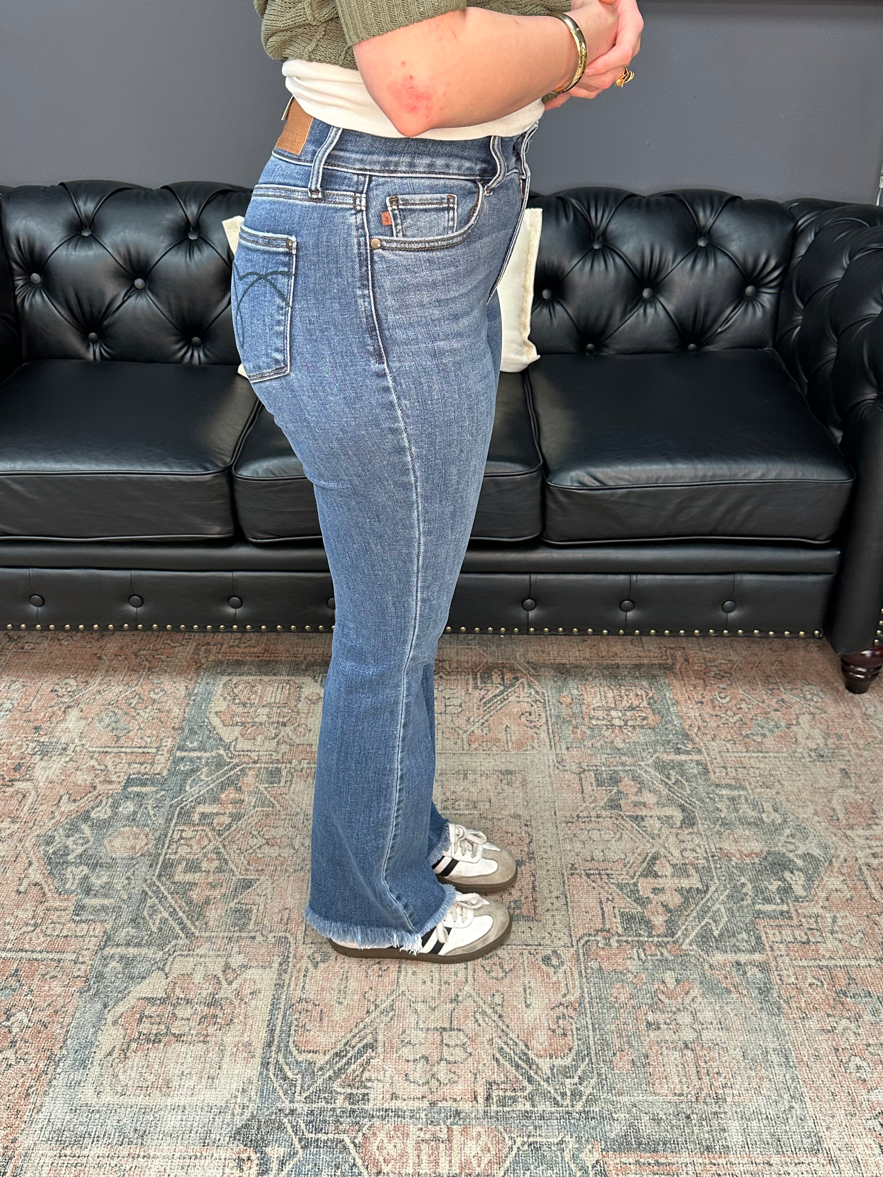 Judy Blue High-Waist Double Button Bootcut Jeans with frayed hem, back pocket stitching, and stretch denim