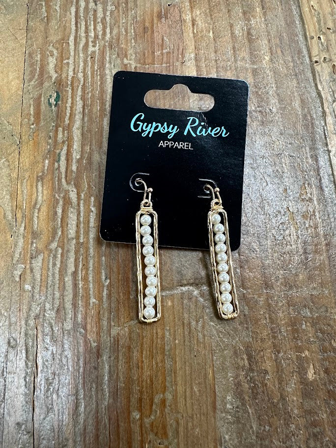 Gold bar drop earrings with classic pearl detail. Lightweight, polished, and perfect for dressing up any look.