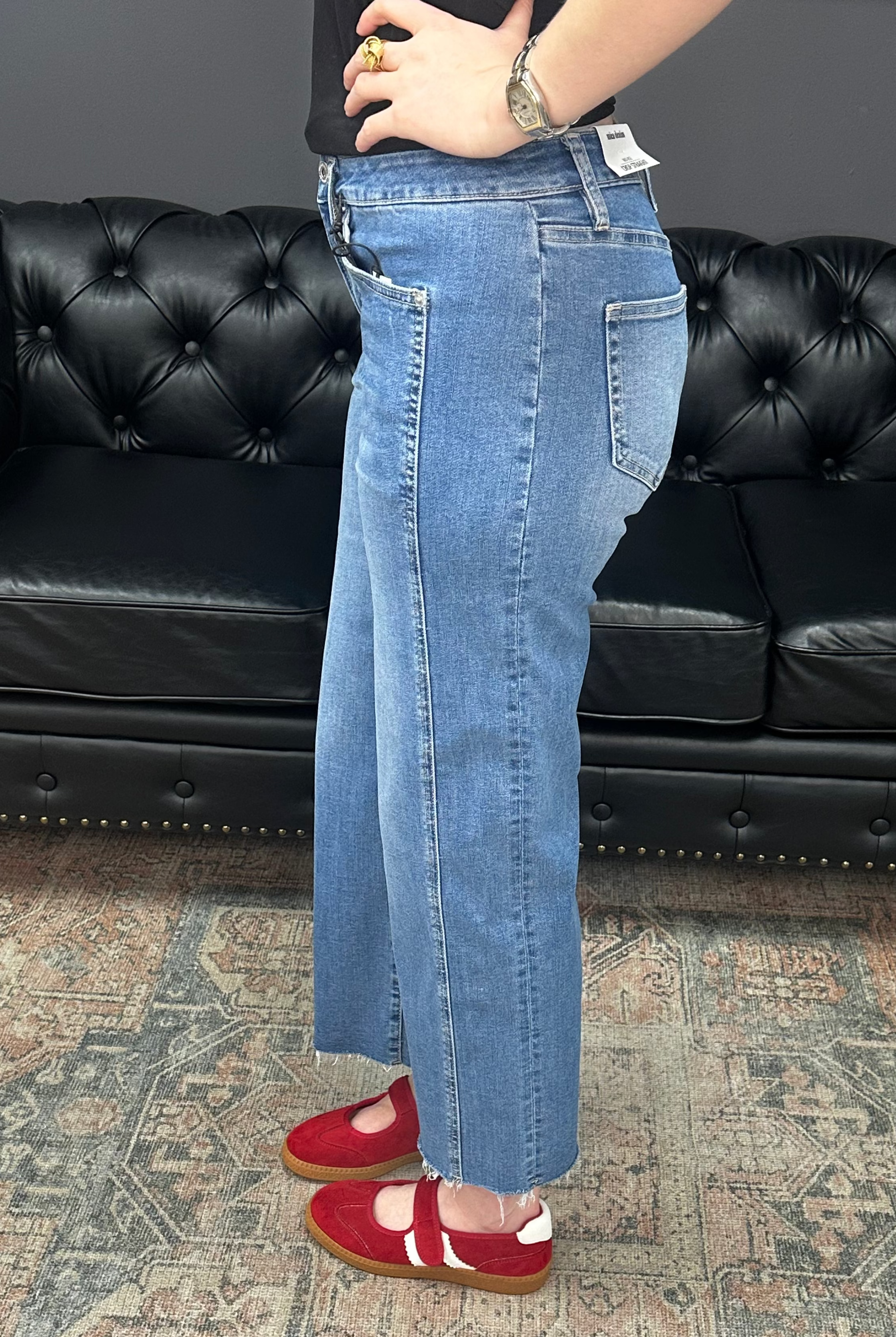 Mid rise tummy tuck cropped straight jeans with raw hem and vertical seam detail for women