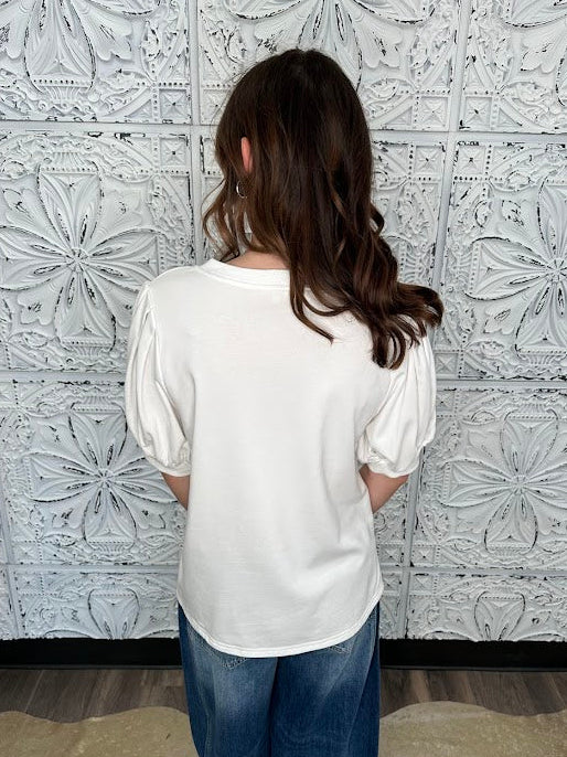 off white cotton top, mineral wash blouse, puff sleeve v neck top, boutique neutral blouse, short sleeve cotton blend top, casual dressy women’s top