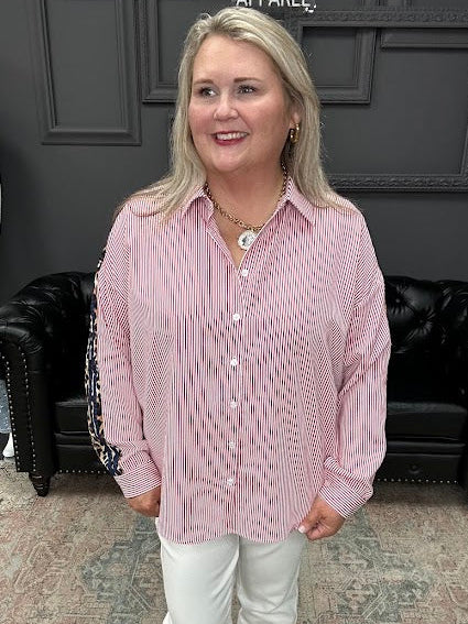 leopard trim top, striped button down blouse, oversized statement top, mixed print blouse, women’s boutique tops, bold contrast blouse