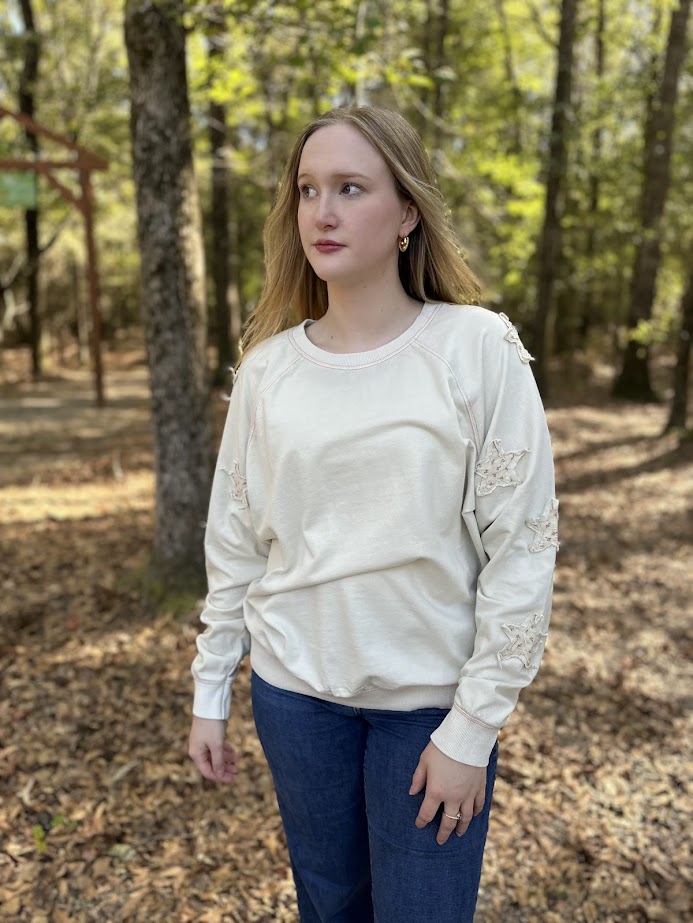 star patch sweatshirt, floral star pullover, mineral washed sweatshirt, relaxed fit cotton top, cozy casual pullover, star detail sweater, 100% cotton sweatshirt, women’s fall pullover, playful casual sweatshirt, everyday loungewear