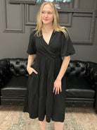 wrap midi dress, balloon sleeve dress, tiered midi dress, black midi dress, boutique dress with pockets, women’s midi dress
