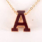 Necklace with a letter 'A' pendant.