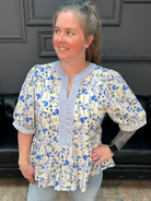 blue floral blouse, peplum floral top, contrast trim blouse, womens spring tops, lightweight woven blouse, feminine boutique tops