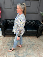 blue floral blouse, peplum floral top, contrast trim blouse, womens spring tops, lightweight woven blouse, feminine boutique tops