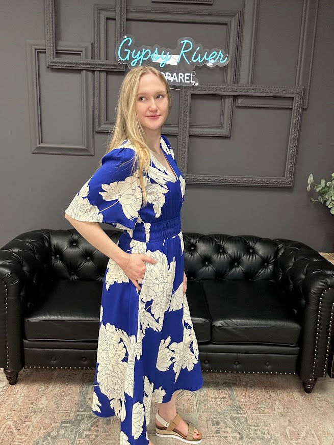 floral midi dress, flutter sleeve dress, lined midi dress, boutique floral dress, dress with pockets, women’s midi dress