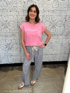 striped barrel pants, drawstring waist pants, black and white stripe pants, boutique wide leg pants, relaxed fit striped trousers, casual chic pants