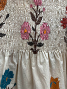 floral smocked top, botanical print blouse, ruffle shoulder blouse, cotton floral top, plus size floral blouse, lightweight woven top, 3/4 sleeve floral shirt