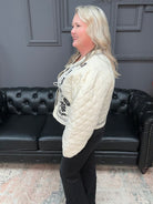 quilted jacket, embroidered jacket, floral quilted coat, cream tie-front jacket, boho fall jacket, boutique outerwear, embroidered outerwear, black and cream jacket, artisan jacket, fall layering piece