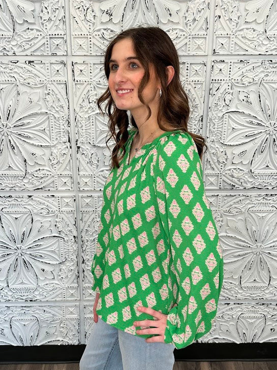 green printed blouse, pink print top, boutique women’s blouse, bold statement blouse, relaxed fit long sleeve top, colorful work blouse