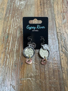 Layered mixed-metal coin earrings with hammered texture and copper accents. Lightweight, eye-catching, and full of character.