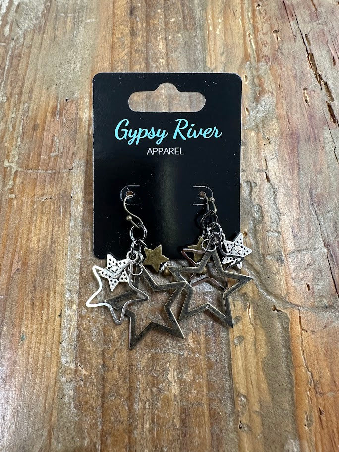Layered mixed-metal star earrings with bold movement and western edge. Lightweight statement style perfect for any outfit.