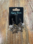Layered mixed-metal star earrings with bold movement and western edge. Lightweight statement style perfect for any outfit.