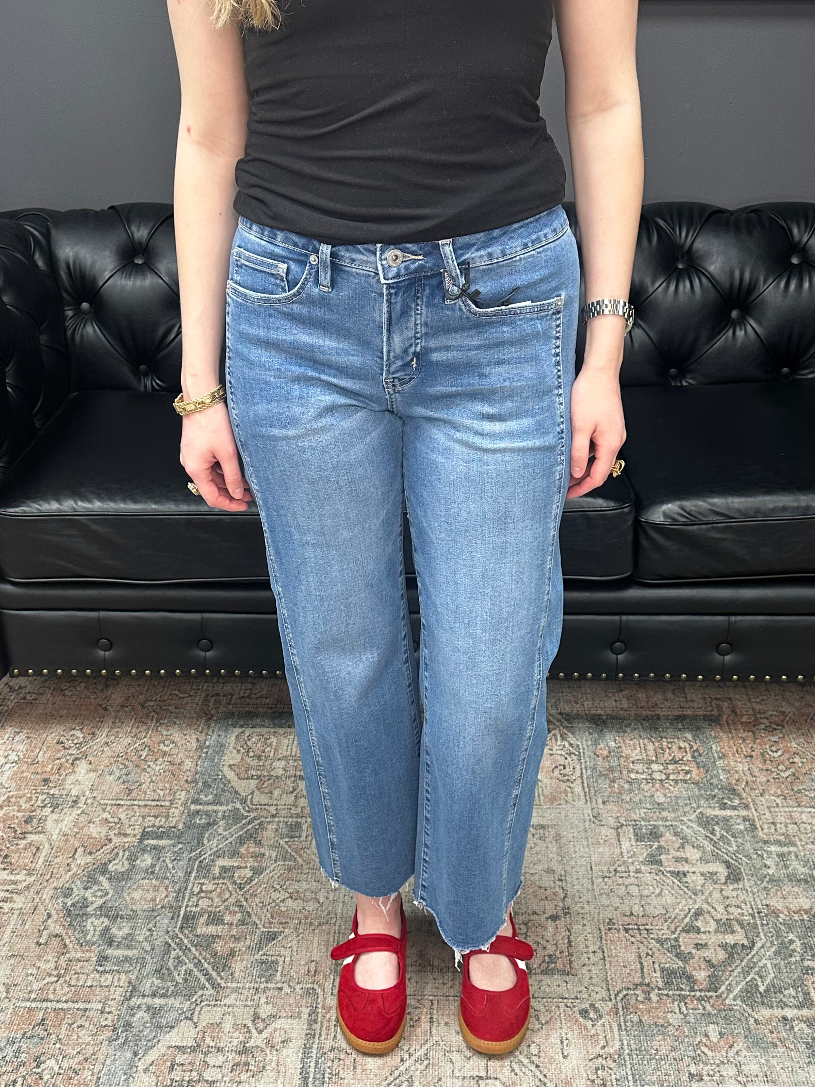 Mid rise tummy tuck cropped straight jeans with raw hem and vertical seam detail for women