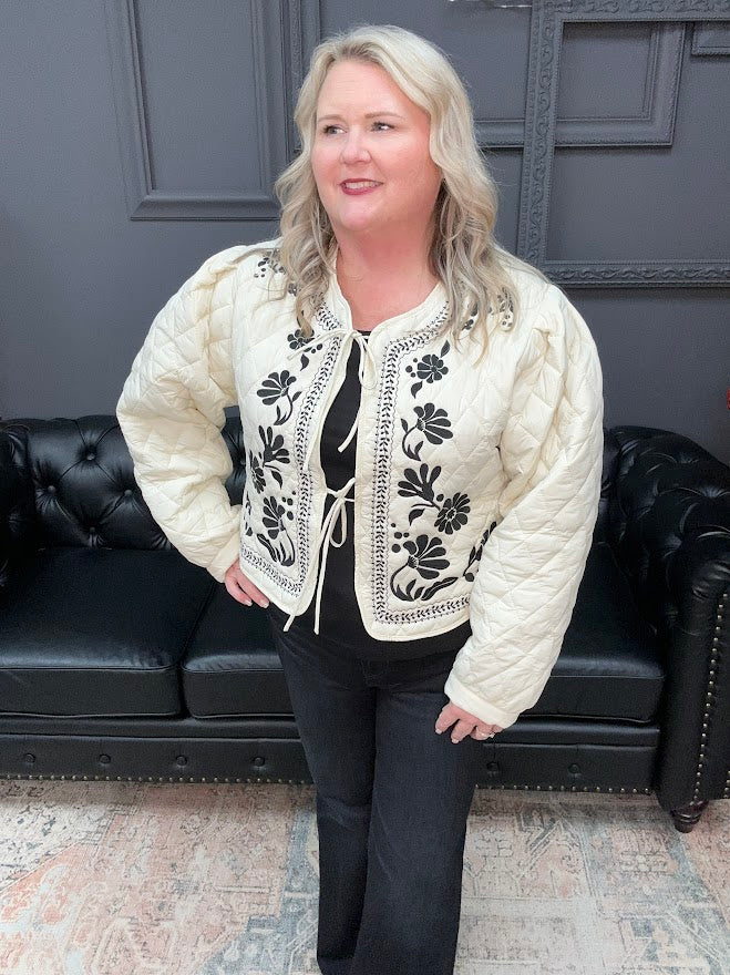 quilted jacket, embroidered jacket, floral quilted coat, cream tie-front jacket, boho fall jacket, boutique outerwear, embroidered outerwear, black and cream jacket, artisan jacket, fall layering piece