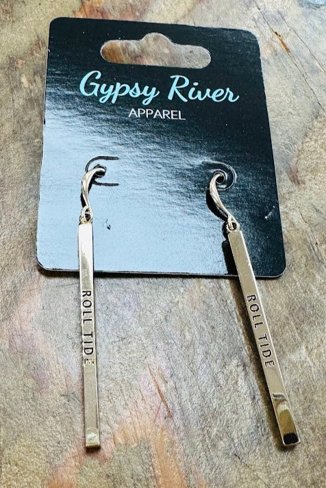 Gold bar Roll Tide bar earrings on a 'Gypsy River Apparel' branded card against a textured surface.