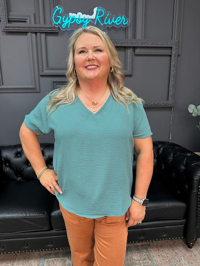 Gypsy River Apparel – Women’s textured V-neck tops in rust orange, teal, and beige, lightweight short sleeve boutique blouses in regular and plus sizes.