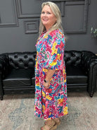 floral peasant dress, boutique floral dress, puff sleeve dress, v notch dress, women’s floral dress, casual midi dress