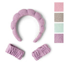 Pink textured headband with matching hair bands on a white background